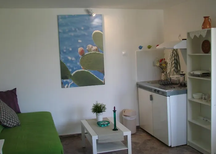 Апартаменты Aegialis Studios &