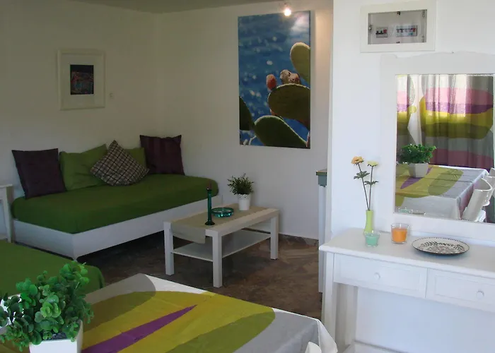 Апартаменты Aegialis Studios &